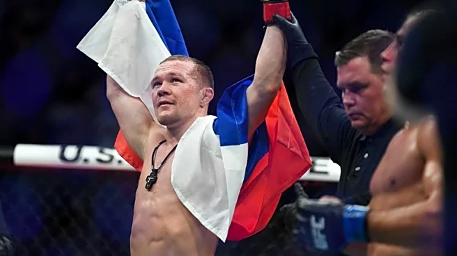 Mixed Martial Arts-Yan beats Dvalishvili on points to claim UFC bantamweight title