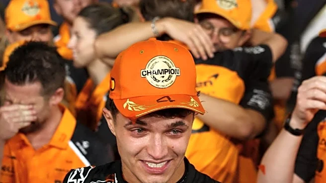 Motor racing-I did it my way, says emotional champion Norris