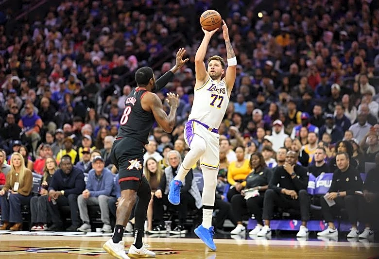 NBA roundup: Luka Doncic, LeBron James lead Lakers past 76ers in return