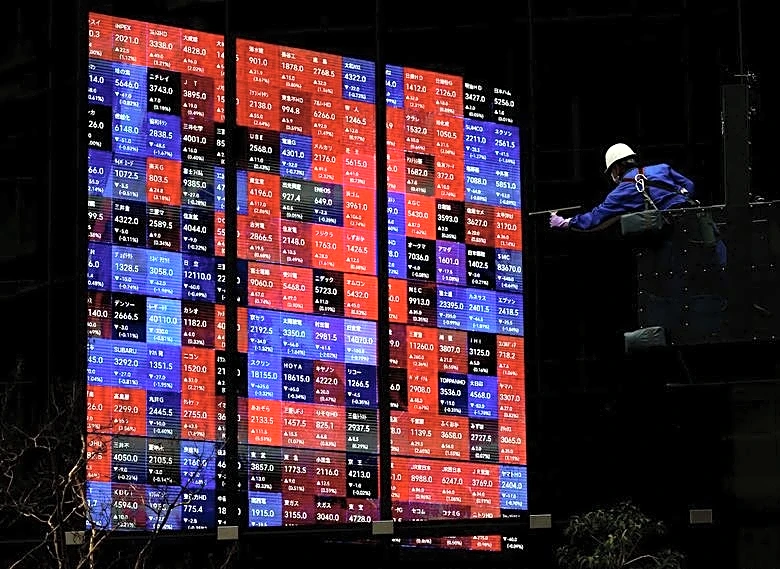 Asian stocks slip as nervy markets wait for Fed