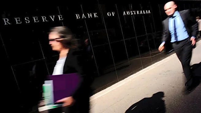 Australia's central bank holds rates steady, warns of inflation risk