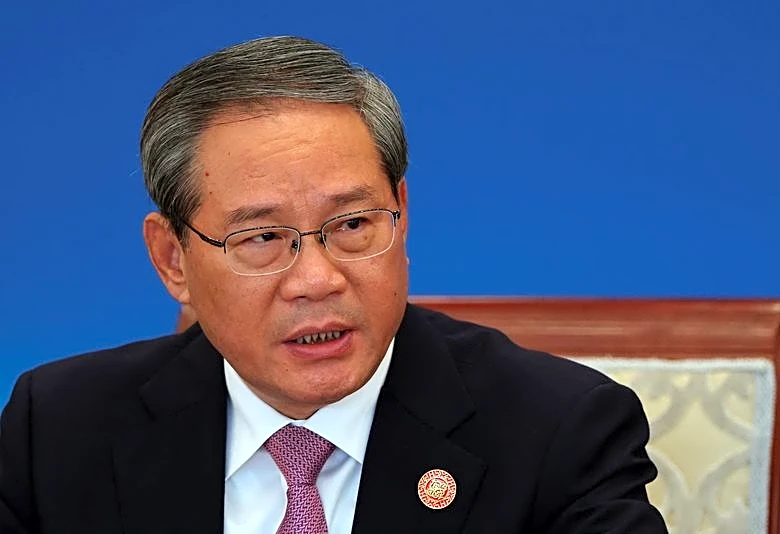 China's Li criticises tariffs as record trade surplus irks export markets