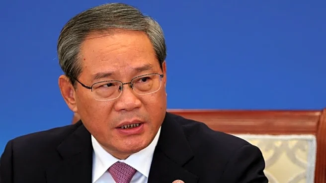 China's Li criticises tariffs as record trade surplus irks export markets