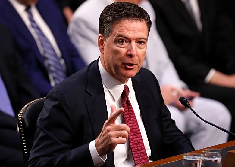 US seeks to lift block on evidence in probe of ex-FBI chief Comey