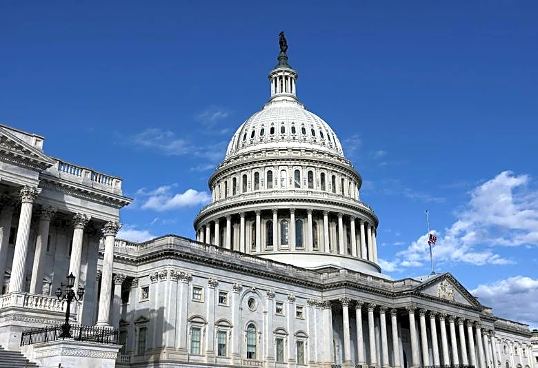 Factbox-Troop pay, Ukraine and social issues - US House passes massive 2026 defense bill