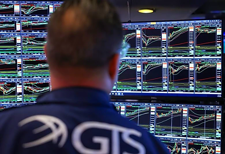 Stocks rise, yields and dollar fall after Fed cuts interest rates 