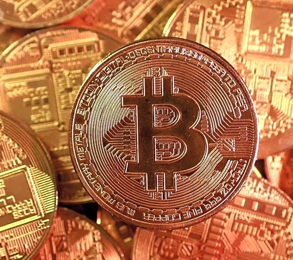 Bitcoin dips below $90,000 as AI worries dent risk appetite