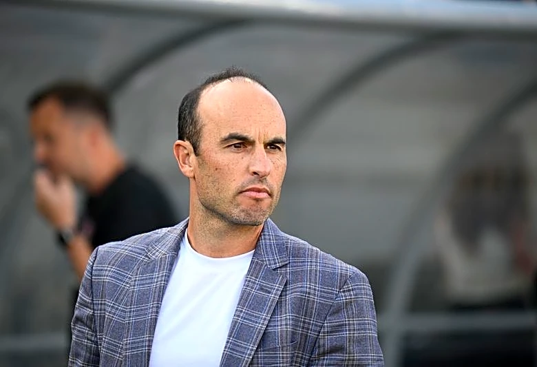 Soccer-Donovan hits back at Australia coach Popovic over World Cup draw reaction