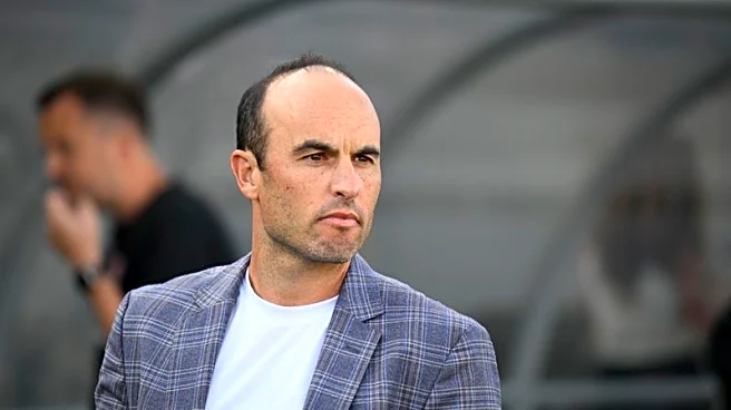 Soccer-Donovan hits back at Australia coach Popovic over World Cup draw reaction