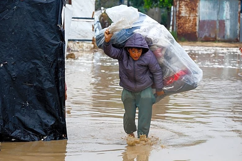UN agency warns displaced Gazans face floods, as emergency supplies blocked