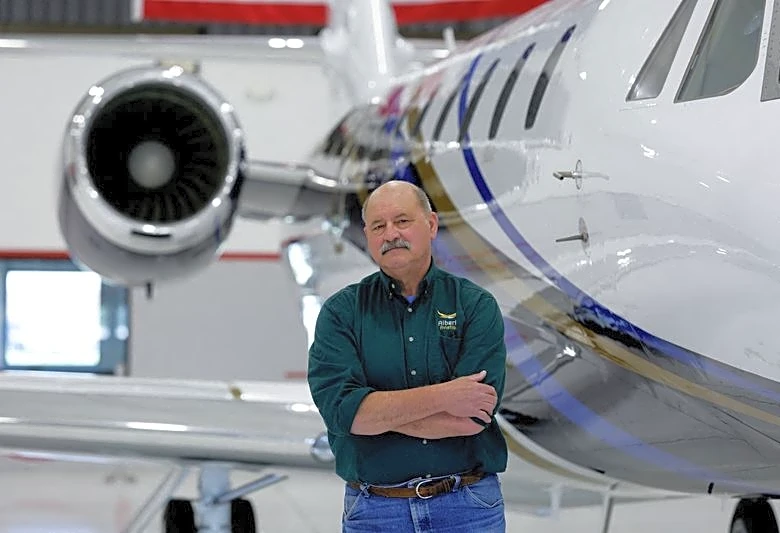 Pinched by higher prices, many Trump voters say: Don't blame the president