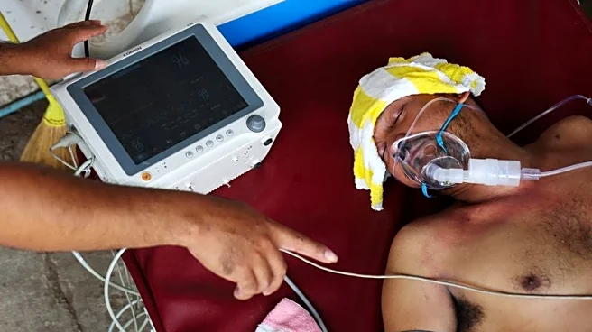 From hospital beds, Cambodian soldiers describe 'toxic gas'