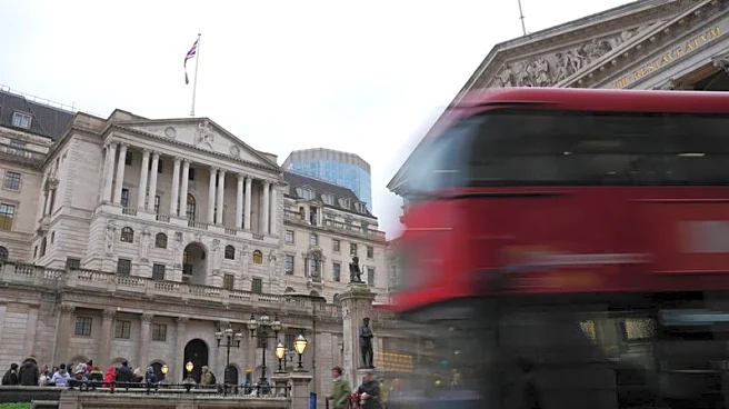 Bank of England cuts rates in tight vote, sterling rises