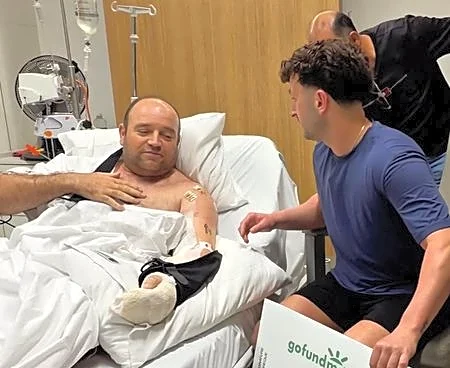 Australia's 'Bondi Hero' handed $1.65 million collected from fundraising