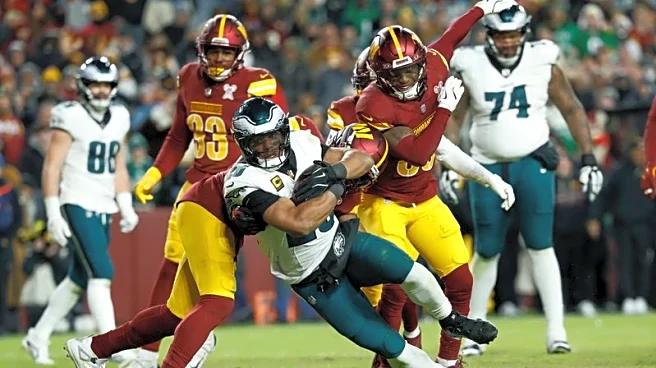 Saquon Barkley, Eagles clinch NFC East title with win over Commanders