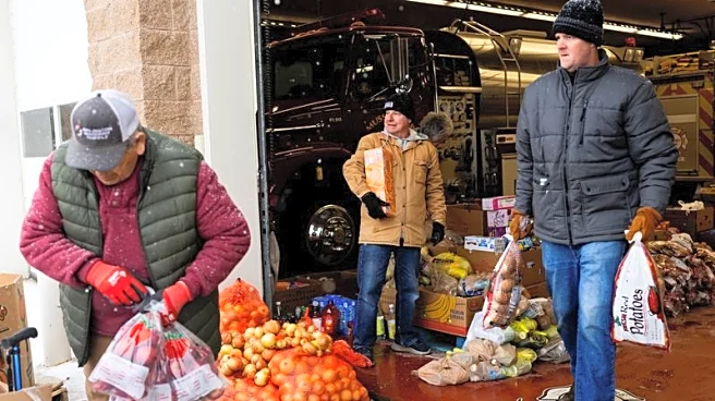 Long lines at the food pantry: Inflation tests Trump’s base in Michigan