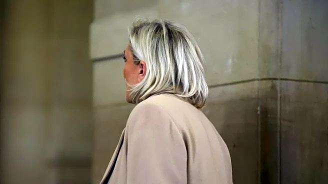 Marine Le Pen arrives for embezzlement appeal in Paris court