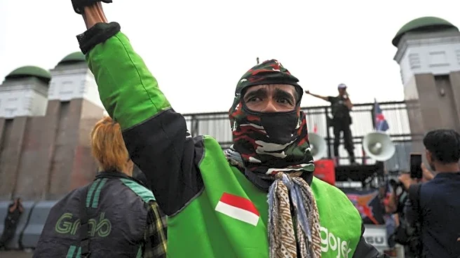 Exclusive-Indonesian ride-hailing industry set for shake-up under draft presidential decree