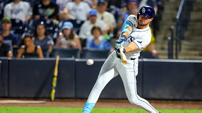 OF Josh Lowe to Angels in three-team, four-player trade