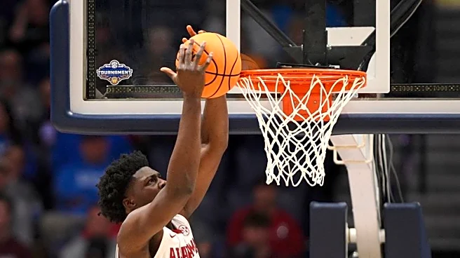 Court temporarily allows ex-Alabama player to return to basketball team