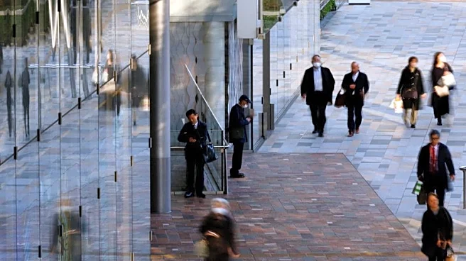 Japan retains cautious economic view, flags risks from US trade policies