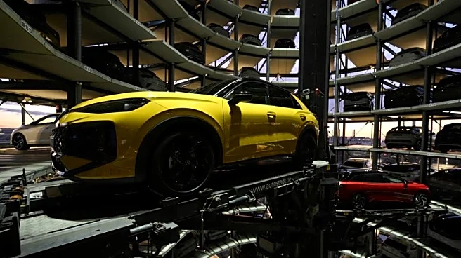 VW shares jump to top of Germany's DAX after it reports upbeat automotive cash flow