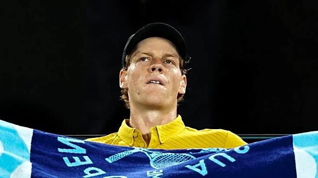 Tennis-Survivor Sinner battles cramp, heat to reach fourth round