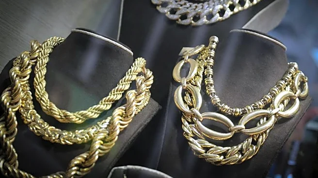 Gold races to $5,100 record peak on safe-haven demand