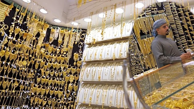 Gold races to $5,100 record peak on frantic safe-haven demand