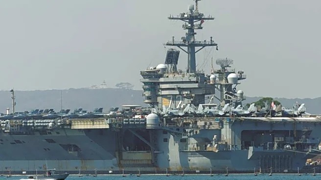 US aircraft carrier enters Middle East region, officials say