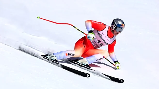 Alpine skiing-Von Allmen heads to Olympics with a win, Odermatt fourth