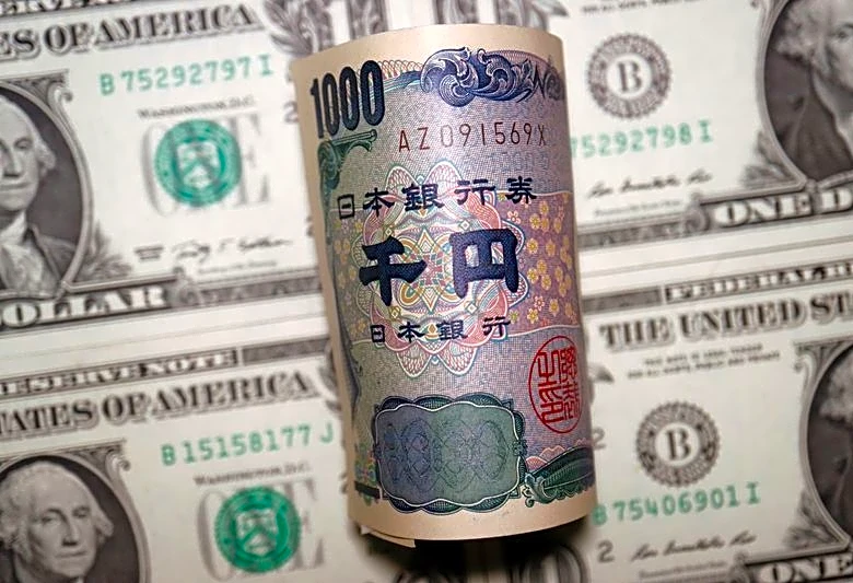 Dollar steady, yen wobbles ahead of Japan election