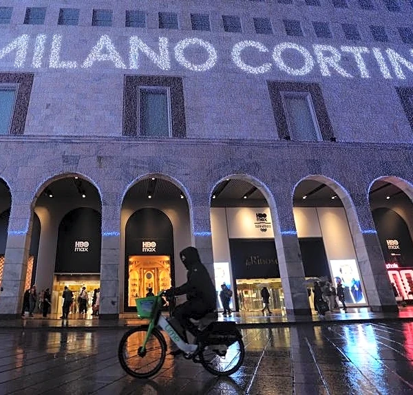 Olympics-Milan greets Games with mixture of pride and misgivings