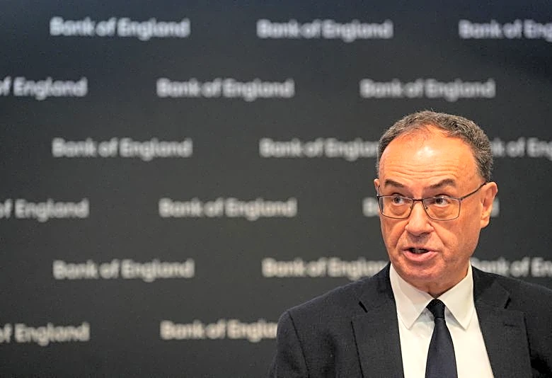 Bank of England governor speaks after close vote to hold rates