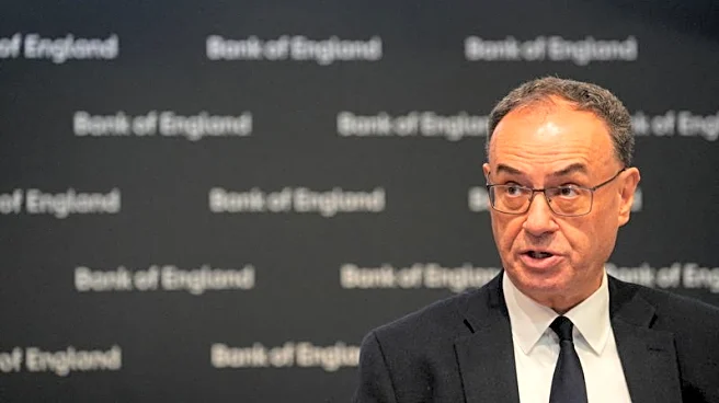 Bank of England governor speaks after close vote to hold rates
