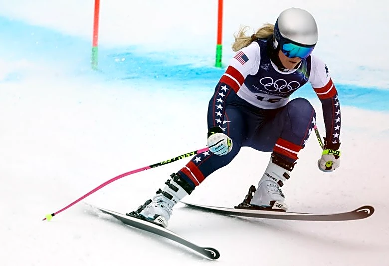 Olympics-Alpine skiing-Johnson fastest, Vonn third in interrupted final training