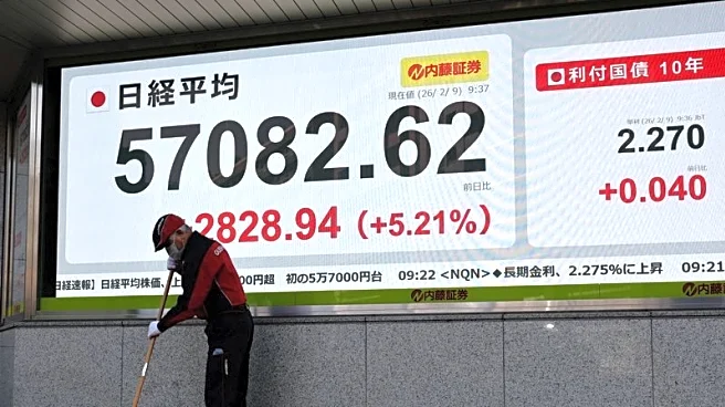 Japan stocks surge to record, bonds slide with yen on Takaichi's landslide election win