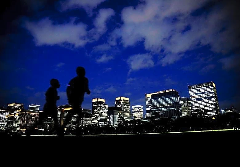 Japan says companies can rebuff unsolicited bids amid takeover risk concerns