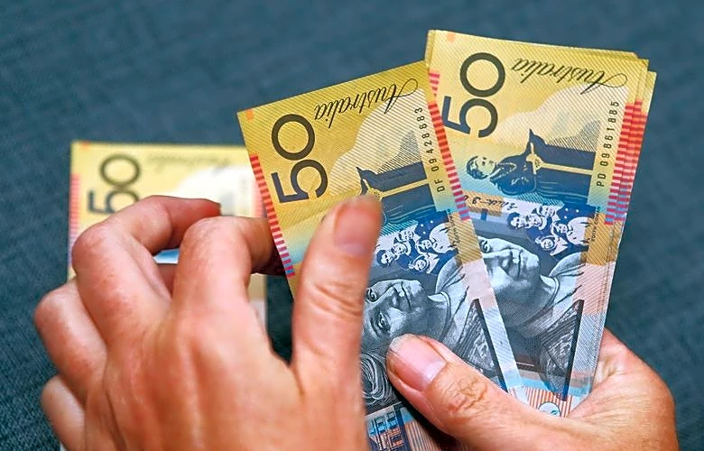Major Australian pension fund says Aussie dollar undervalued, boosts currency holding