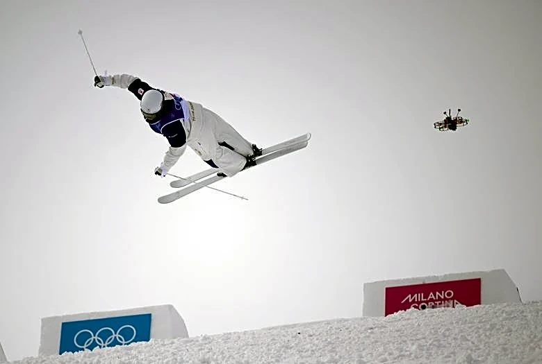 Olympics-Freestyle skiing-Japan's Horishima tops moguls qualifying, Kingsbury and Wallberg also advance