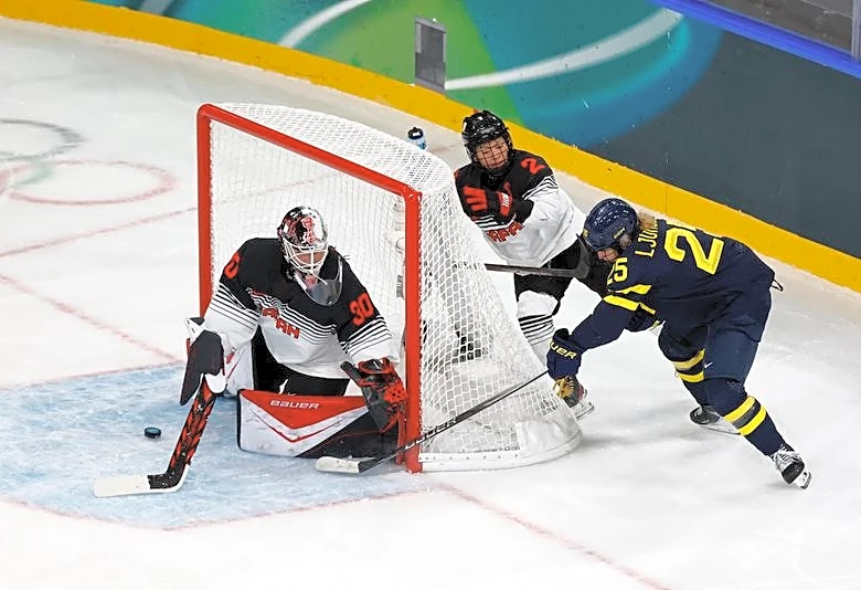 Olympics-Ice hockey-Japan goalie Halloran makes late debut, ends Games without conceding a goal