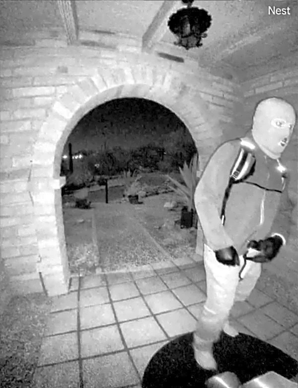 US officials release images of armed person at Nancy Guthrie's door