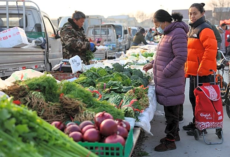 China's producer deflation persists, consumer inflation cools in Jan