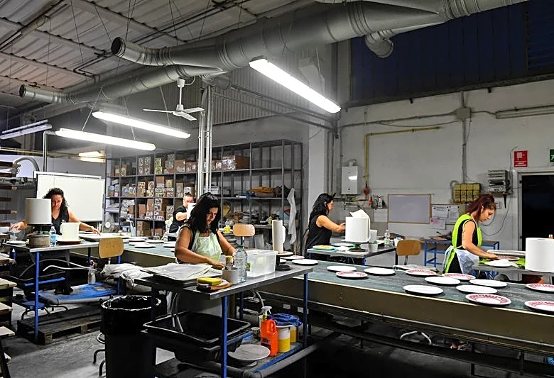 Italy industry output falls in December, but signs long slump is easing