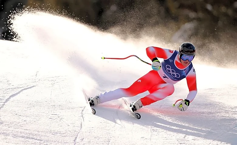 Olympics-Alpine sking-Swiss golden boy Von Allmen wins super-G to complete hat-trick