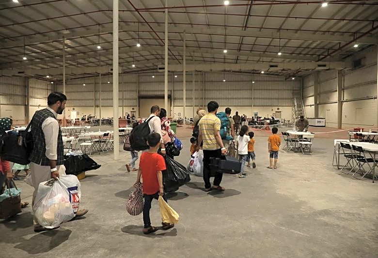 US pays Afghans stranded in Qatar to repatriate, plan labeled 'betrayal'