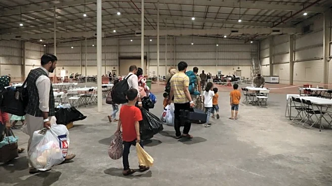 US pays Afghans stranded in Qatar to repatriate, plan labeled 'betrayal'