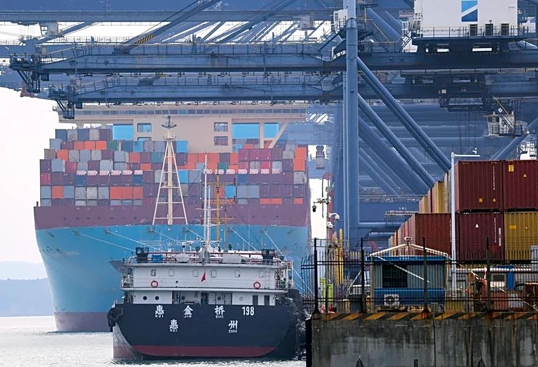 Analysis-Global shipping industry sticks with green investments, despite carbon price delay