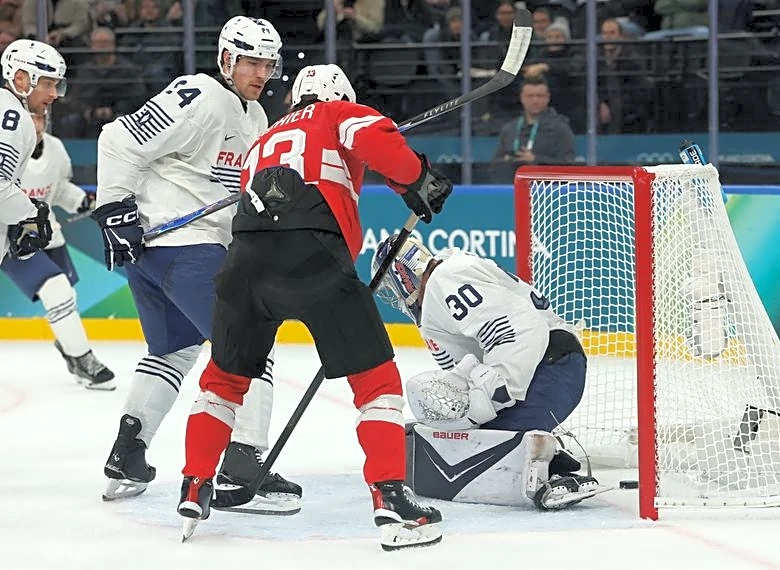 Olympics-Ice hockey-Switzerland cruise by France in Milan opener