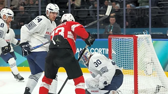 Olympics-Ice hockey-Switzerland cruise by France in Milan opener